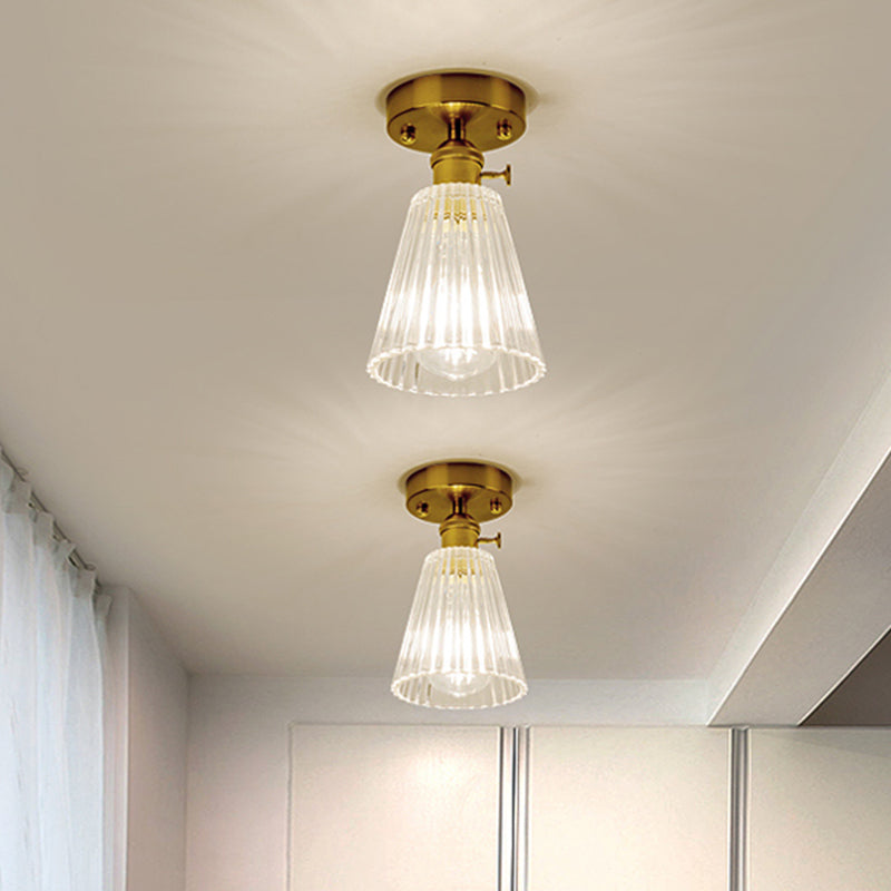 Industrial Chic Meets Modern Versatility: The Clear Glass Single-Light Gold Ceiling Light