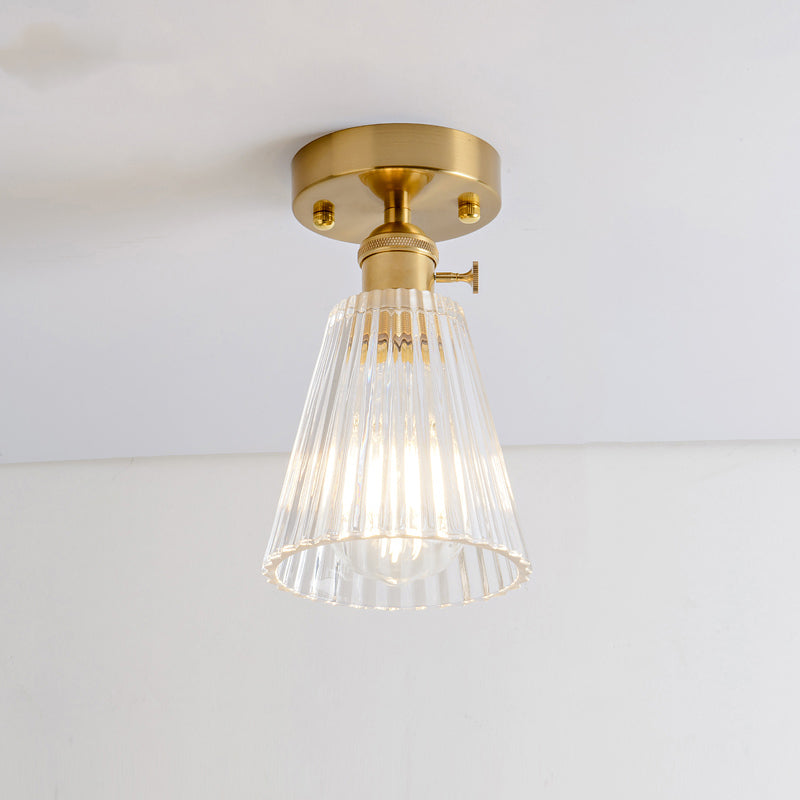 Industrial Chic Meets Modern Versatility: The Clear Glass Single-Light Gold Ceiling Light