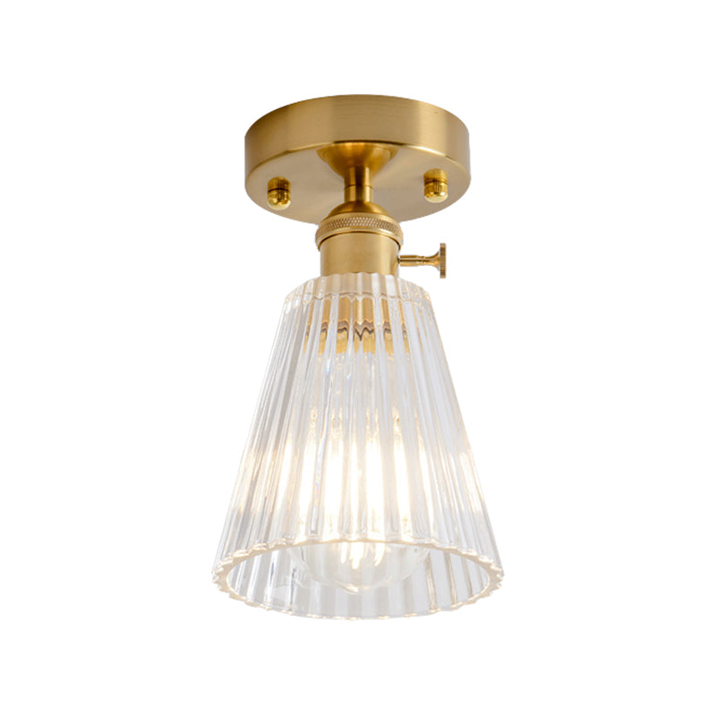 Industrial Chic Meets Modern Versatility: The Clear Glass Single-Light Gold Ceiling Light