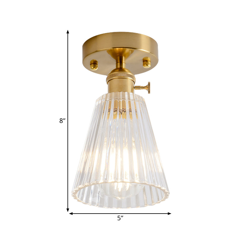 Industrial Chic Meets Modern Versatility: The Clear Glass Single-Light Gold Ceiling Light