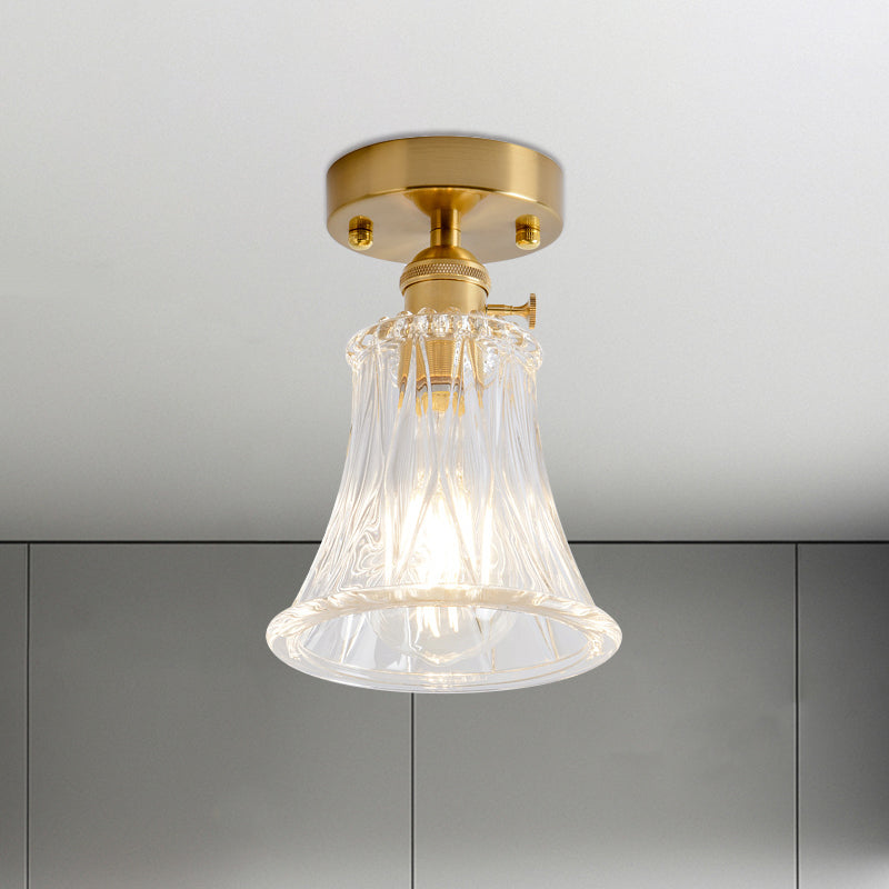 Industrial Chic Meets Modern Versatility: The Clear Glass Single-Light Gold Ceiling Light
