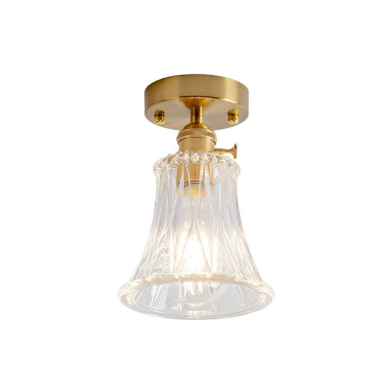 Industrial Chic Meets Modern Versatility: The Clear Glass Single-Light Gold Ceiling Light