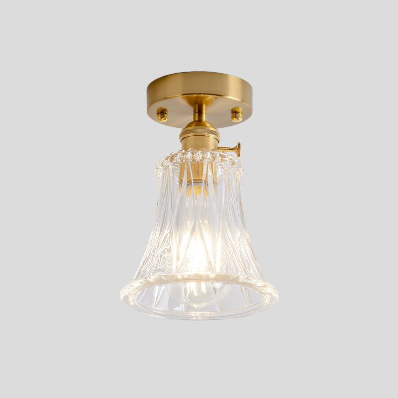 Industrial Chic Meets Modern Versatility: The Clear Glass Single-Light Gold Ceiling Light