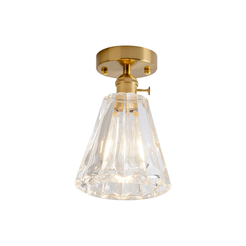 Industrial Chic Meets Modern Versatility: The Clear Glass Single-Light Gold Ceiling Light