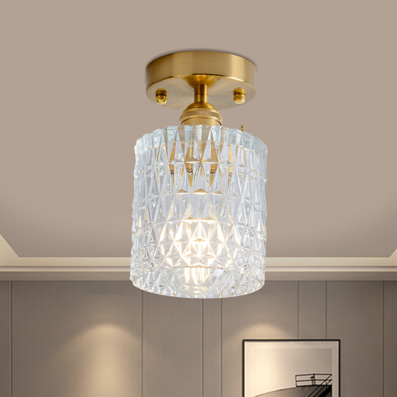 Industrial Chic Meets Modern Versatility: The Clear Glass Single-Light Gold Ceiling Light