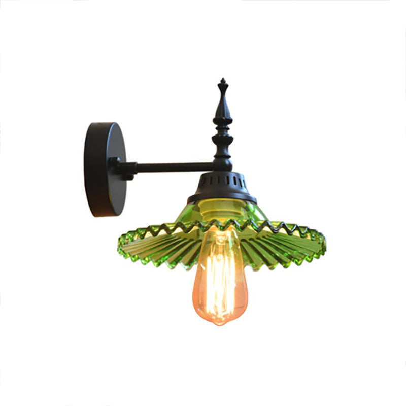 Light Up Your Space with Industrial Chic: The 1-Light Black Sconce with Clear/Green Glass