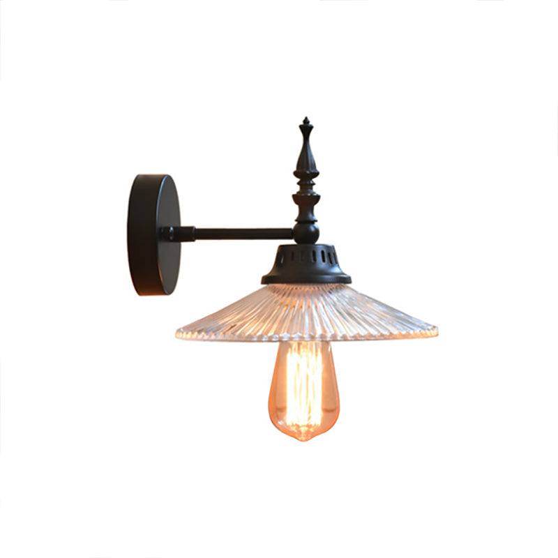 Light Up Your Space with Industrial Chic: The 1-Light Black Sconce with Clear/Green Glass