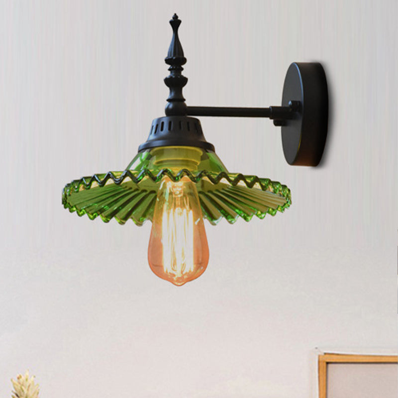 Light Up Your Space with Industrial Chic: The 1-Light Black Sconce with Clear/Green Glass