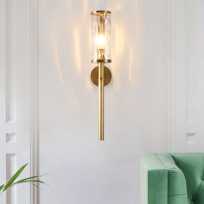 Arthur's Elegant Embrace: Modern Brass Wall Sconce with Clear Glass Shade