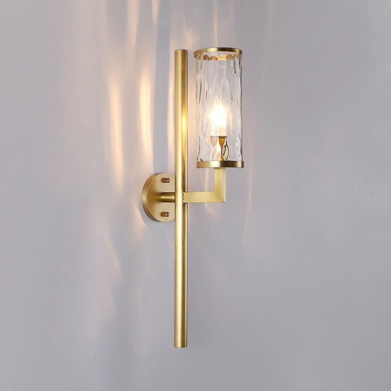 Arthur's Elegant Embrace: Modern Brass Wall Sconce with Clear Glass Shade