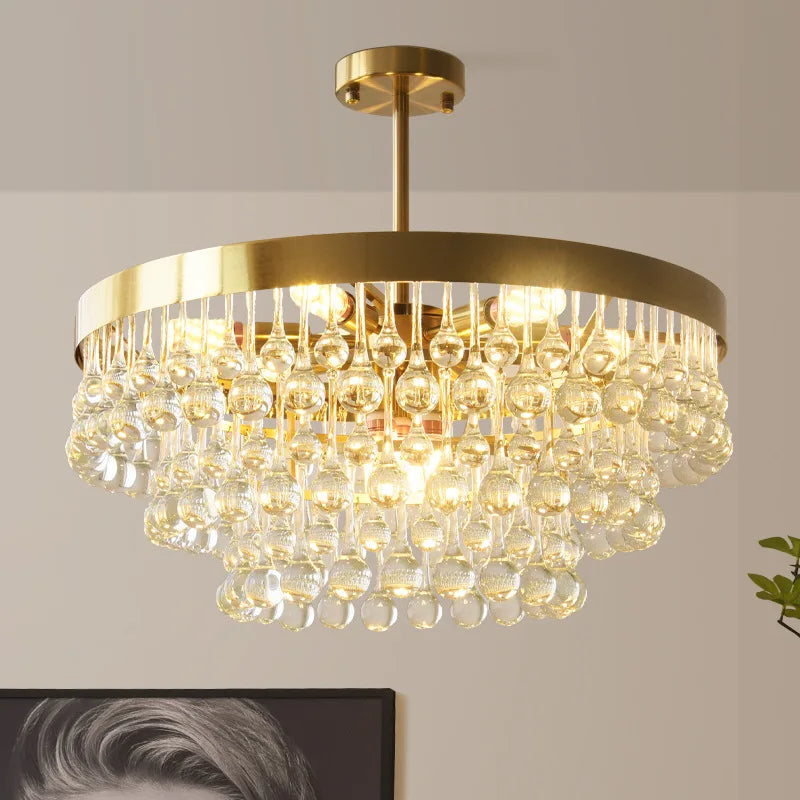 Elegant Round Water Drop Golden Chandelier - A Postmodern Light Luxury Fixture for Living Rooms, Bedrooms, and Dining Spaces