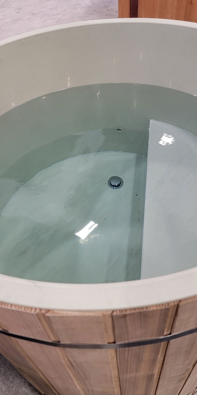 Dynamic PVC barrel cold plunge interior showing ergonomic built-in seat 38 inch wide insulated PVC lining
