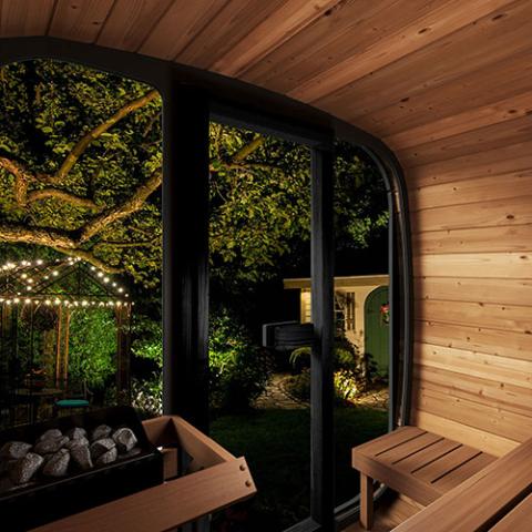 SaunaLife Cube-Series CL5G 4-person outdoor cube sauna full tempered bronze glass front Thermo-Spruce exterior in backyard