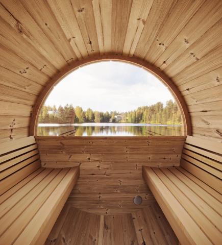 SaunaLife E8W panoramic half-moon tempered bronze glass rear window flooding barrel sauna interior with natural light
